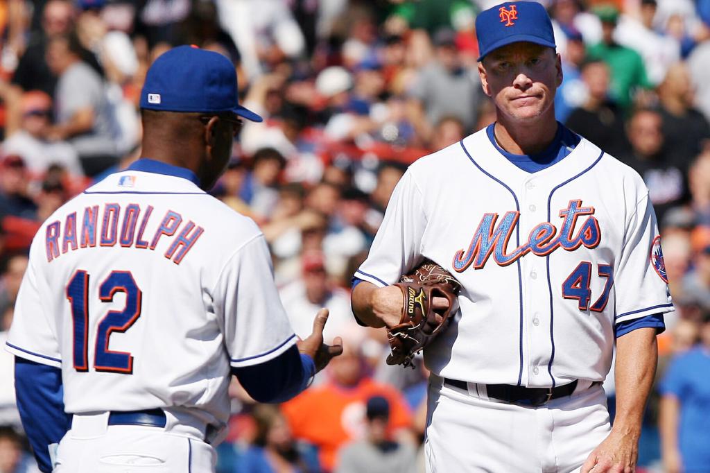 New York Mets starting pitcher Tom Glavine is pulled from the game by manager Willie Randolph after giving up 7 runs in the first inning against the Florida Marlins at Shea Stadium in New York City on September 30, 2007