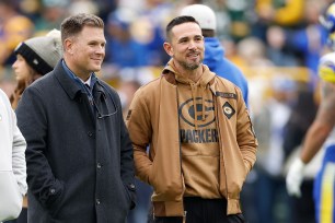 Brian Gutekunst (left) has picked a defensive back in the first round three times since taking over as Packers GM in 2018.