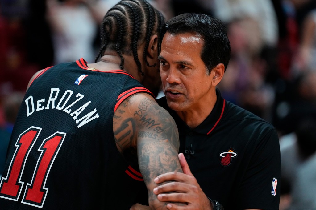 Erik Spoelstra (r.) and the Heat are back as the No. 8 seed in the Eastern Conference playoffs.