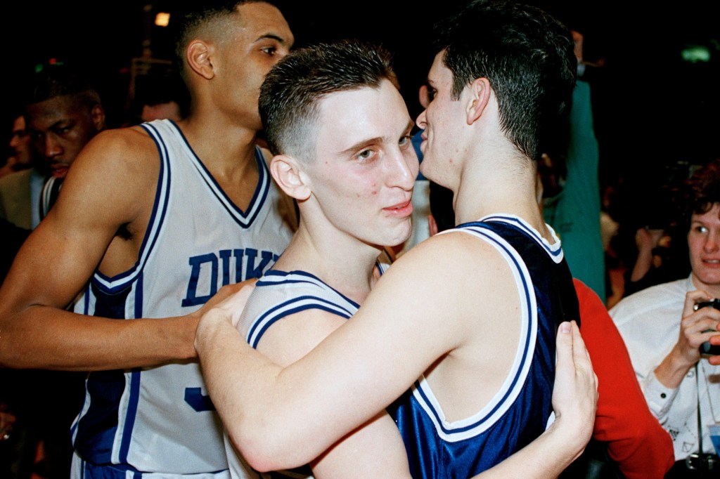 Bobby (l.) and Dan Hurley embrace after Duke defeated Seton Hall in March 1992.