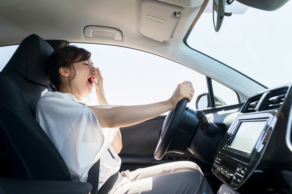 yawning female driver. 