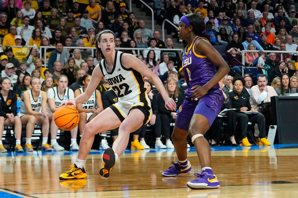 Iowa's Caitlin Clark dribbles against LSU's Flau'jae Johnson on Monday.