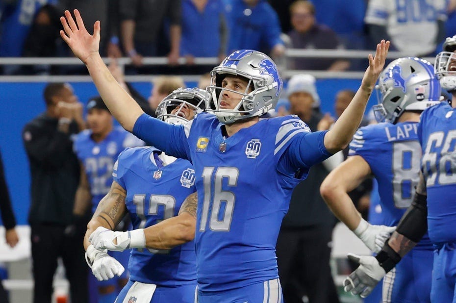 Jared Goff celebrates during the Lions' wild-card playoff win over the Rams on Jan. 14, 2024.