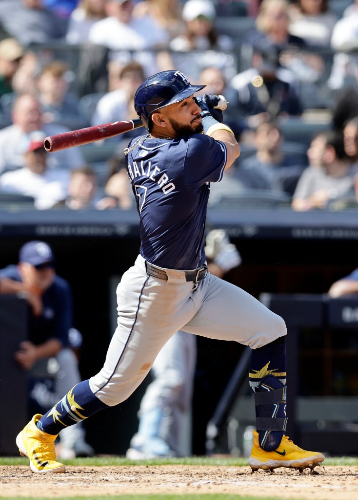 Jose Caballero hits an RBI-double in 10th inning of the Rays' win over the Yankees on April 20, 2024. 