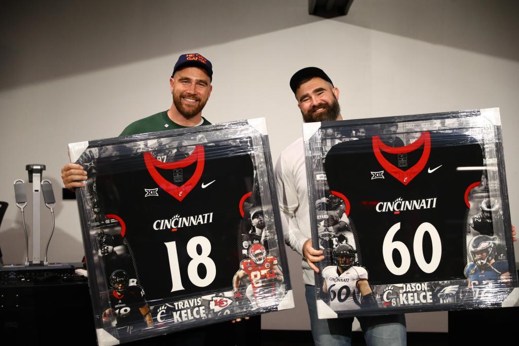 Brothers Travis Kelce and Jason Kelce at the live taping of their “New Heights” podcast at Fifth Third Arena in Cincinnati on April 11, 2024.