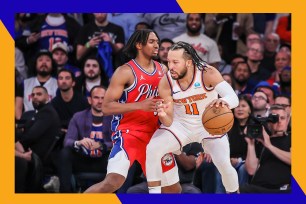 A basketball player in a Knicks uniform with a ball in front of him