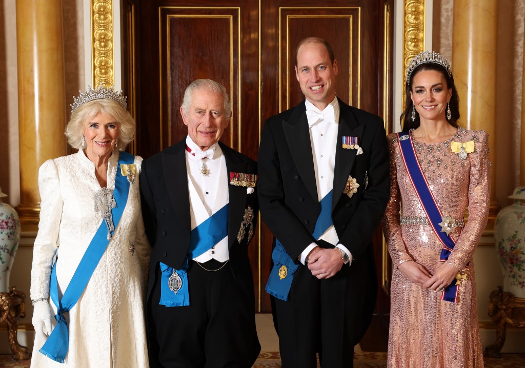 (L-R) Queen Camilla, King Charles III, Prince William, Prince of Wales and Catherine, Princess of Wales pose for a photograph ahead of The Diplomatic Reception in the 1844 Room at Buckingham Palace on December 05, 2023 in London, England. (Photo by Chris Jackson/Getty Images For Buckingham Palace)