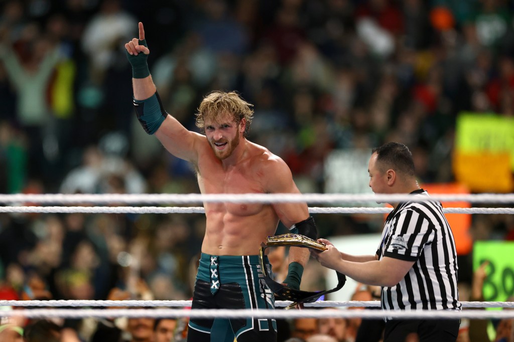 Logan Paul reacts after winning a match against Randy Orton and Kevin Owens during WrestleMania 40.