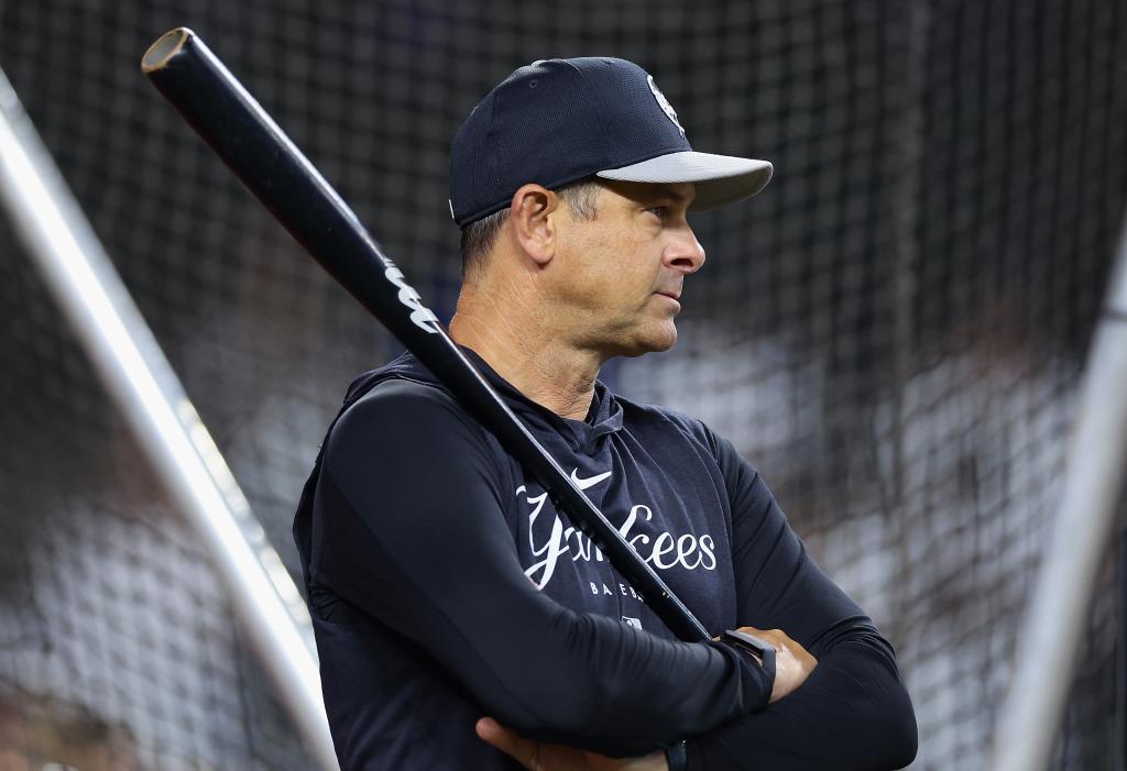 Aaron Boone, manager of the New York Yankees, watching batting practice at Chase Field before a game against the Arizona Diamondbacks