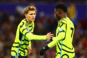 Arsenal's Martin Odegaard and Bukayo Saka take on Aston Villa on Sunday in the Premier League.