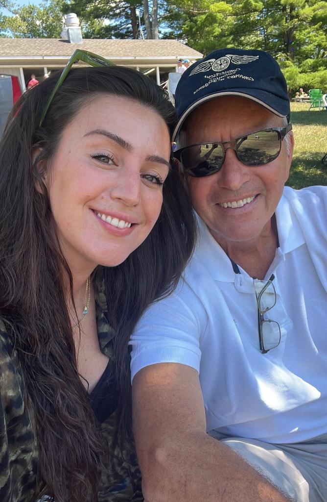 Karla Covell and her father Robert Covell taking a selfie.