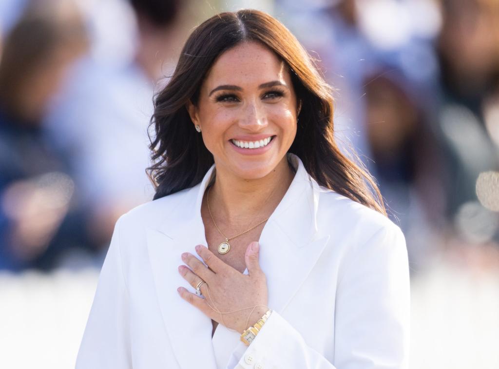 Meghan, Duchess of Sussex, in a white suit attending a reception at the Invictus Games 2020 in The Hague, Netherlands