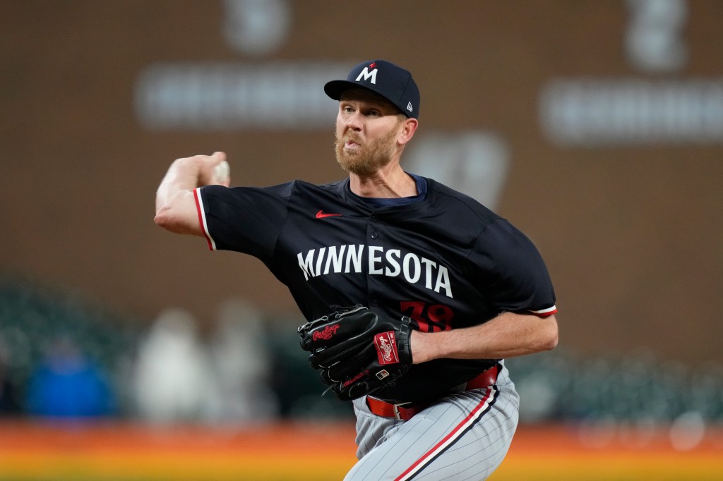 Twins pitcher Michael Tonkin throws during the seventh inning of a baseball game