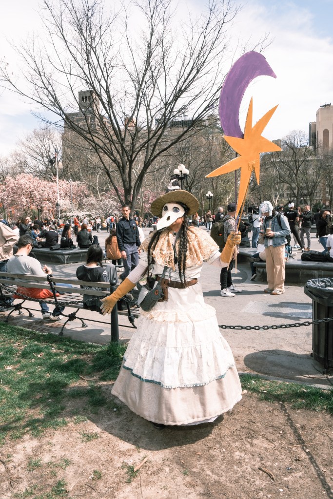 Tina Pina, a "Mexican witch," preparing for the eclipse at Washington Square Park.