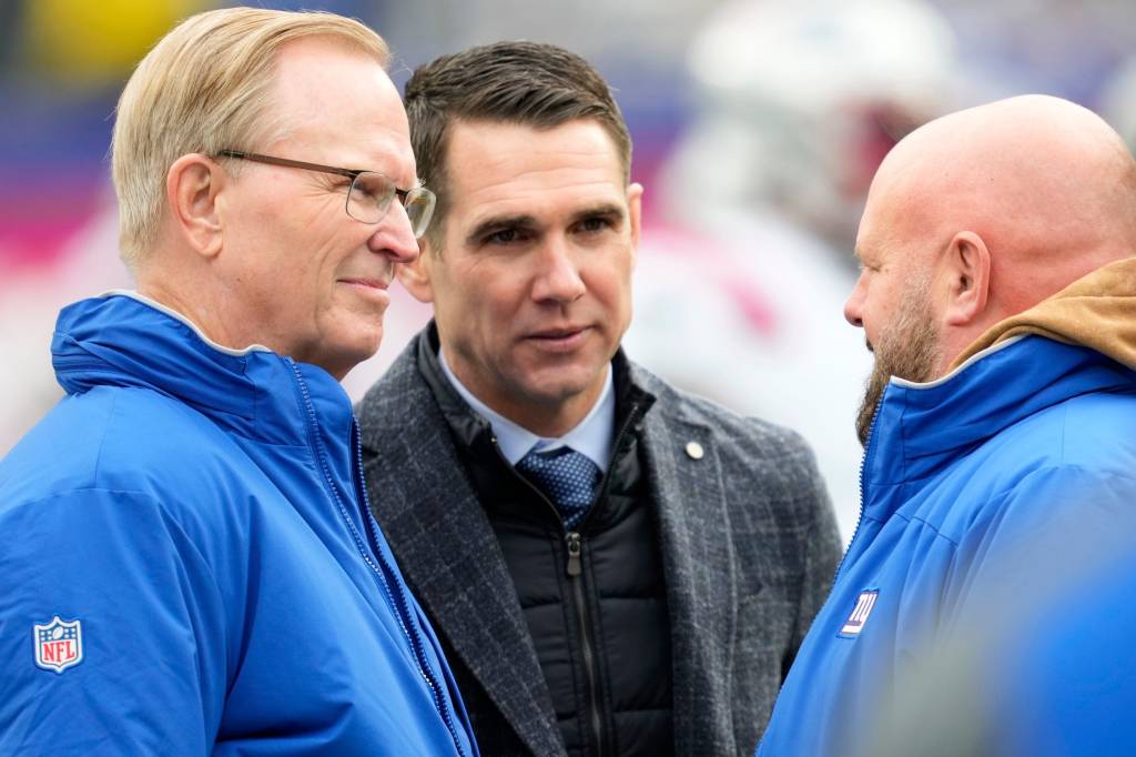 President of the New York Giants, John Mara (left) and New York Giants General Manager, Joe Schoen, speak with New York Giants Head Coach, Brian Daboll, before playing the New England Patriots, on Sunday, November 26, 2023.