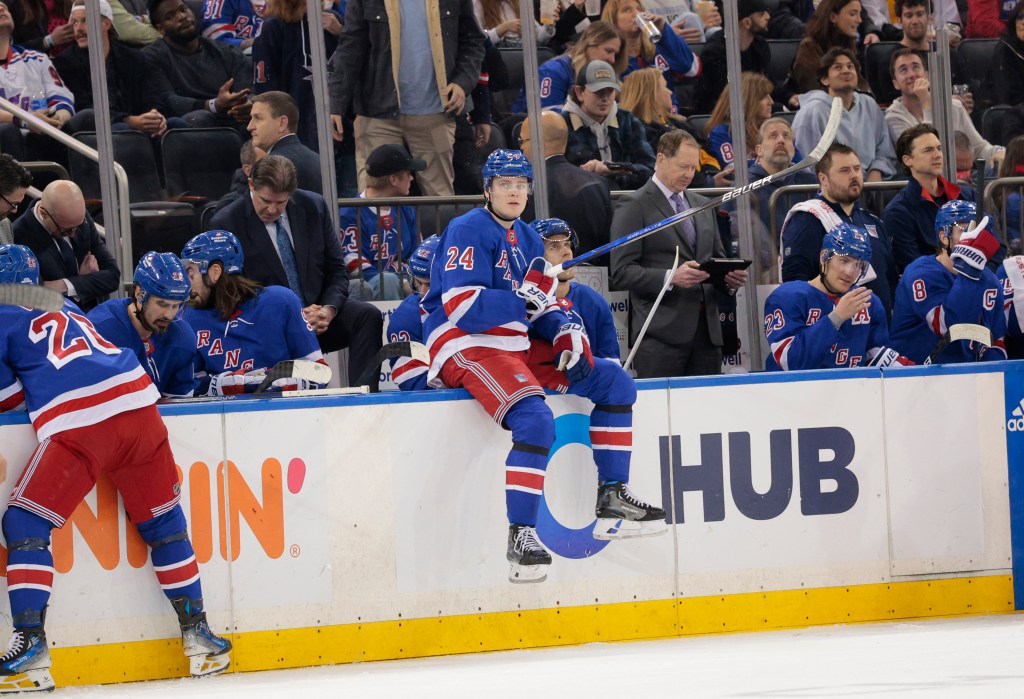  Rangers right wing Kaapo Kakko #24, sitting on the boards during a video challenge replay