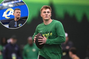 Oregon quarterback Bo Nix warms up before a position drill at the school's NFL Pro Day, Tuesday, March 12, 2024, in Eugene, Ore. 