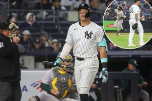 Aaron Judge walks to the dugout after striking out in the seventh inning of the Yankees' 3-1 loss to the A's. Tyler Nevin (inset) rounds the bases after hitting a homer of Tyler Nevin.