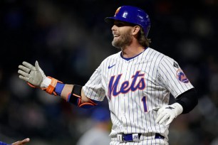 Jeff McNeil celebrates after hitting a single during the eighth inning of the Mets' 6-1 win over the Royals.