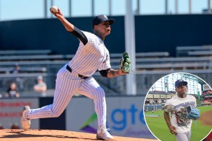 Baseball player Marcus Stroman in action, throwing a ball