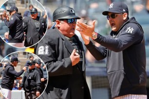 Aaron Boone argues with the umpire after getting ejected