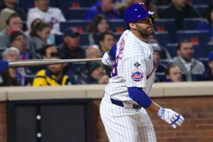 J.D. Martinez rips an RBI double during the sixth inning of the Mets' 4-2 loss to the Cardinals.