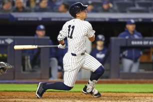 Anthony Volpe hits an RBI single in the seventh inning of the Yankees' 5-3 win over the Rays.