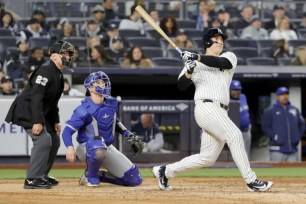 Anthony Rizzo belts a two-run homer in the fifth inning of the Yankees' 9-8 win over the Blue Jays on Saturday night.