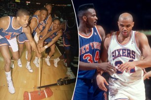 Knicks players celebrate with a broom after beating the 76ers in the 1989 NBA playoffs; Charles Oakley and Charles Barkley