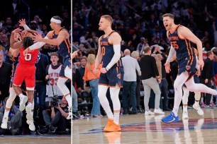 Jalen Brunson and Josh Hart force a steal on Tyrese Maxey; Donte DiVincenzo and Isaiah Hartenstein celebrate during the Knicks' win over the 76ers