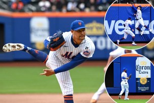 Mets outfielder Starling Marte (6) chases down the ball after he made an error fielding a fly ball.