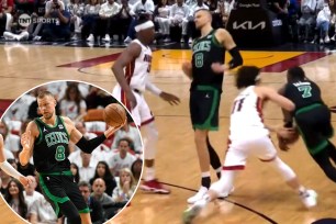 celtics kristaps porzinging leg injury game 4 heat