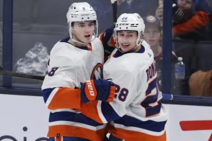 Noah Dobson (left) celebrates with Alexander Romanov after scoring the go-ahead goal in the Islanders' 4-2 win over the Blue Jackets.