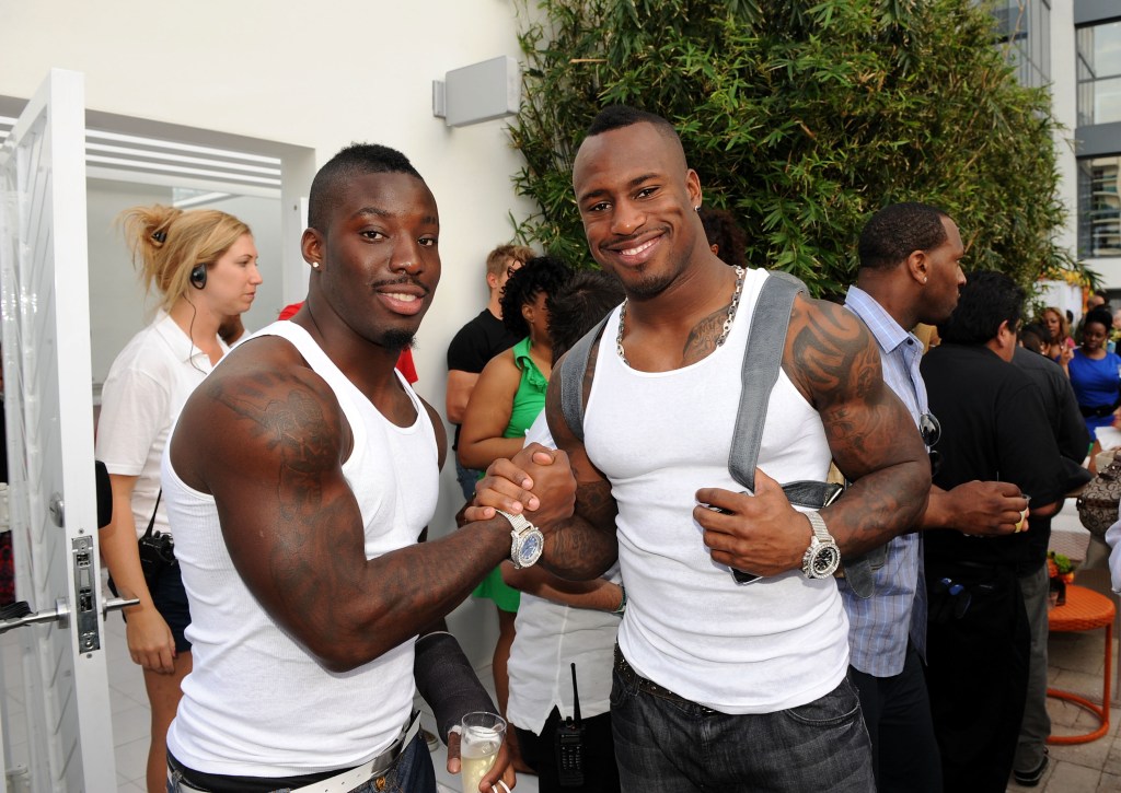 NFL players Vontae Davis and Vernon Davis attend the launch of New Tide Plus Febreze Freshness Sport at The Recreation Deck at The W South Beach on February 5, 2010