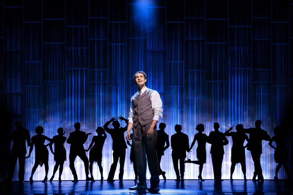 Noah J. Ricketts onstage with the cast