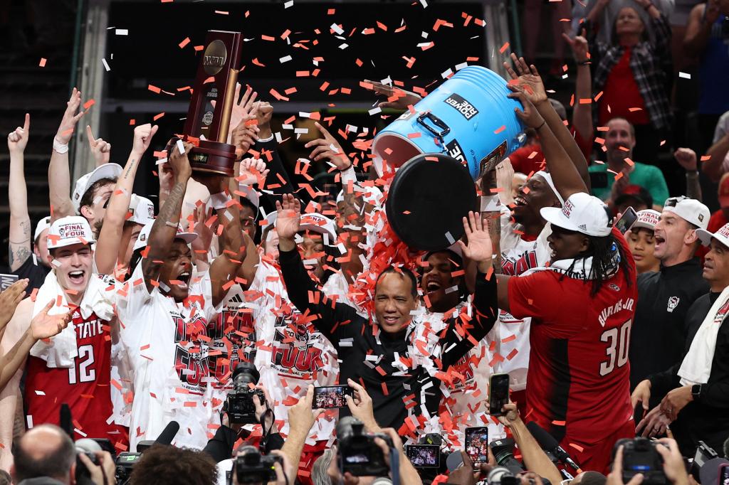 NC State celbrates its March Madness win over Duke on Sunday.