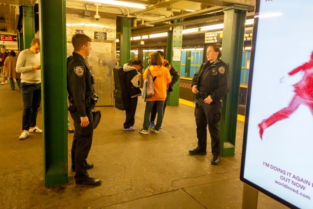 NYPD at the West 4th St station of the A C E in downtown Manhattan where someone was pushed onto the subway tracks.