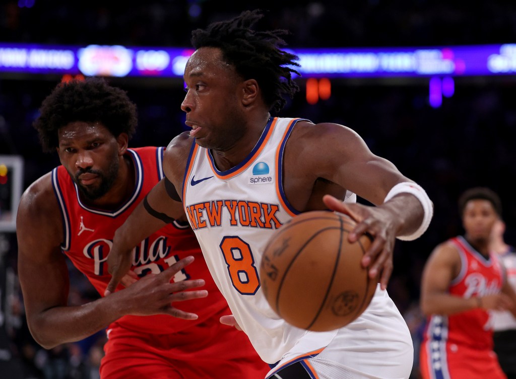 OG Anunoby #8 of the New York Knicks heads for the net as Joel Embiid #21 of the Philadelphia 76ers defends during the second half in game one of the Eastern Conference First Round Playoffs at Madison Square Garden on April 20, 2024 in New York City. 