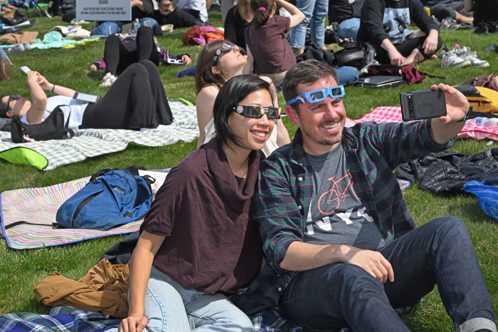 At least 7,000 people were expected for the event as they set up blankets and put on their eclipse glasses.