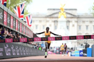 Peres Jepchirchir of Kenya crossing the finish line, winning the Women's elite race at the 2024 TCS London Marathon and setting a new world record