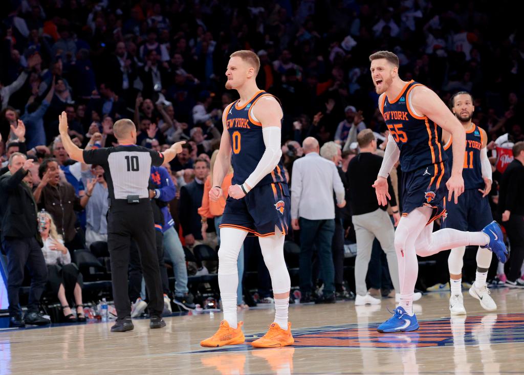 Knicks guard Donte DiVincenzo #0 reacts after hitting the game winning three point shot over 76ers Nicolas Batum