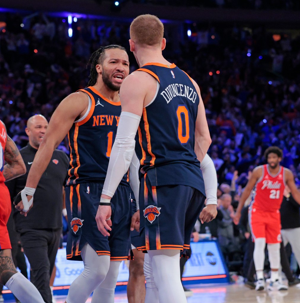 New York Knicks guard Jalen Brunson reacts along side New York Knicks guard Donte DiVincenzo #0 at the end of the first round of playoffs. 