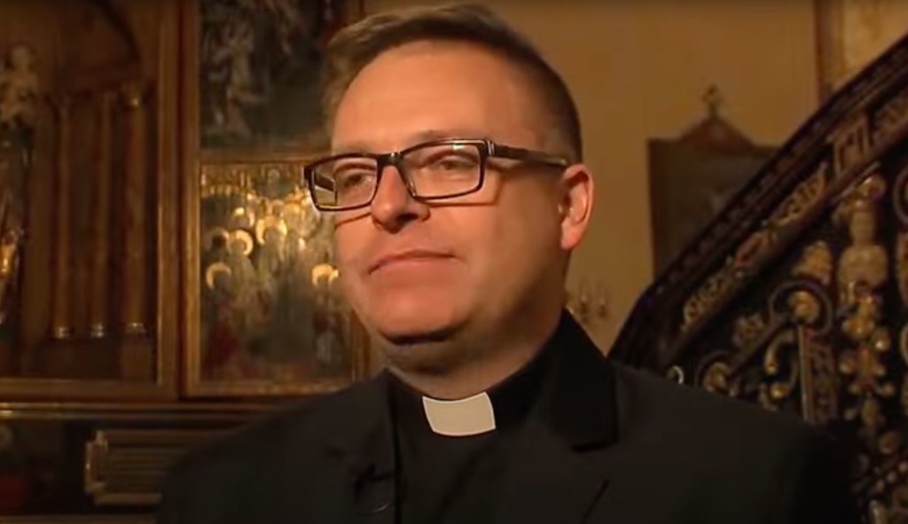 Father Tomasz Zmarzły