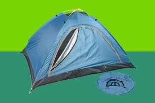 A blue tent set against a green background