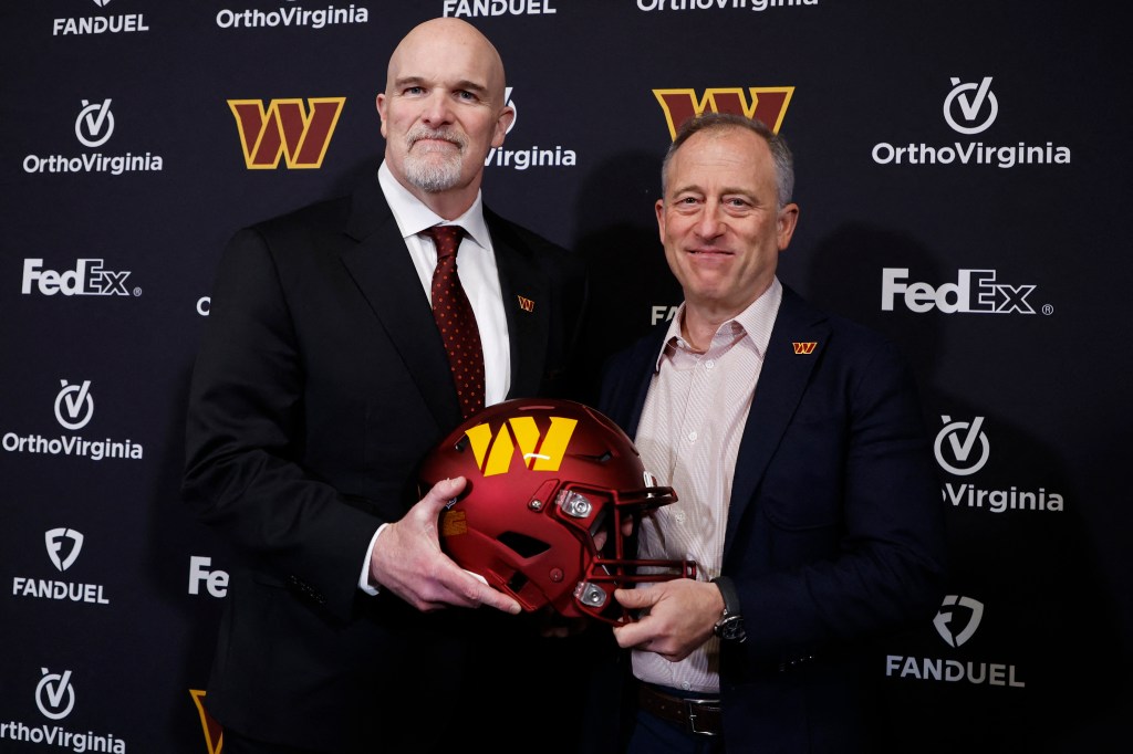 Dan Quinn (l) is the Commanders' new coach.