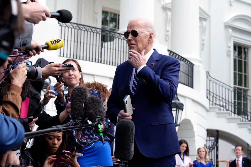 President Joe Biden talks with reporters on the South Lawn of the White House in Washington, Thursday, April 25, 2024, before departing on a trip to New York. 