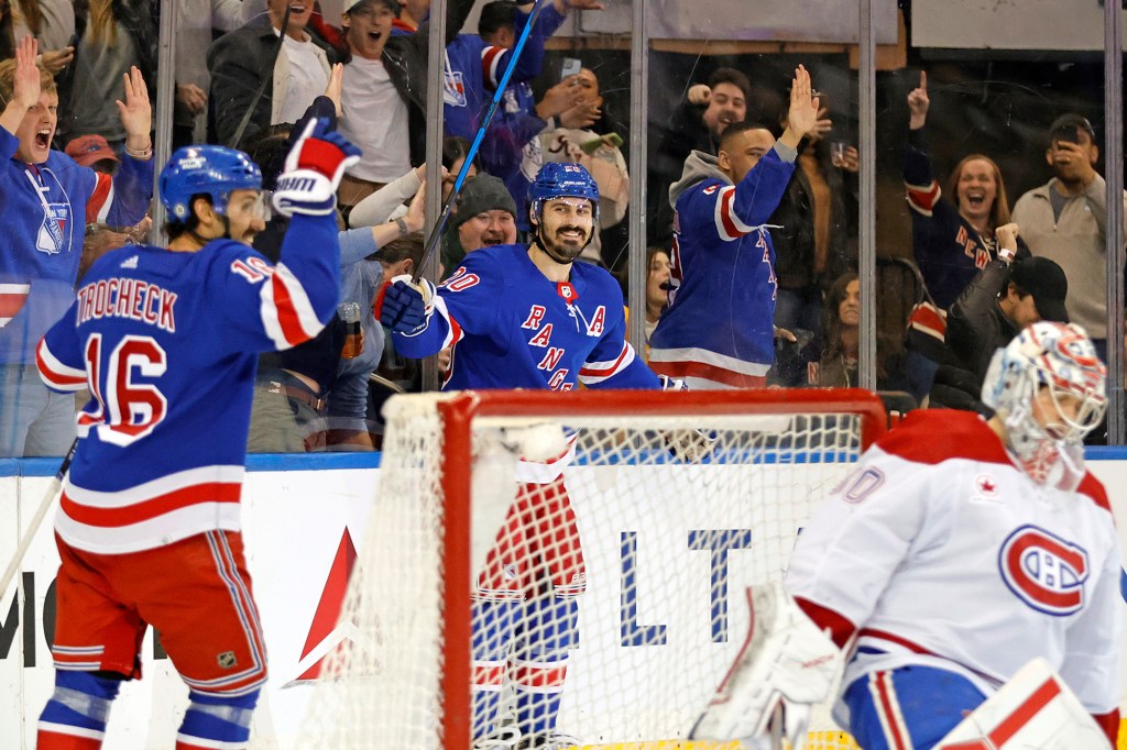 Chris Kreider celebrates a goal with Vincent Trocheck during the Rangers' win against the Canadiens on Sunday.