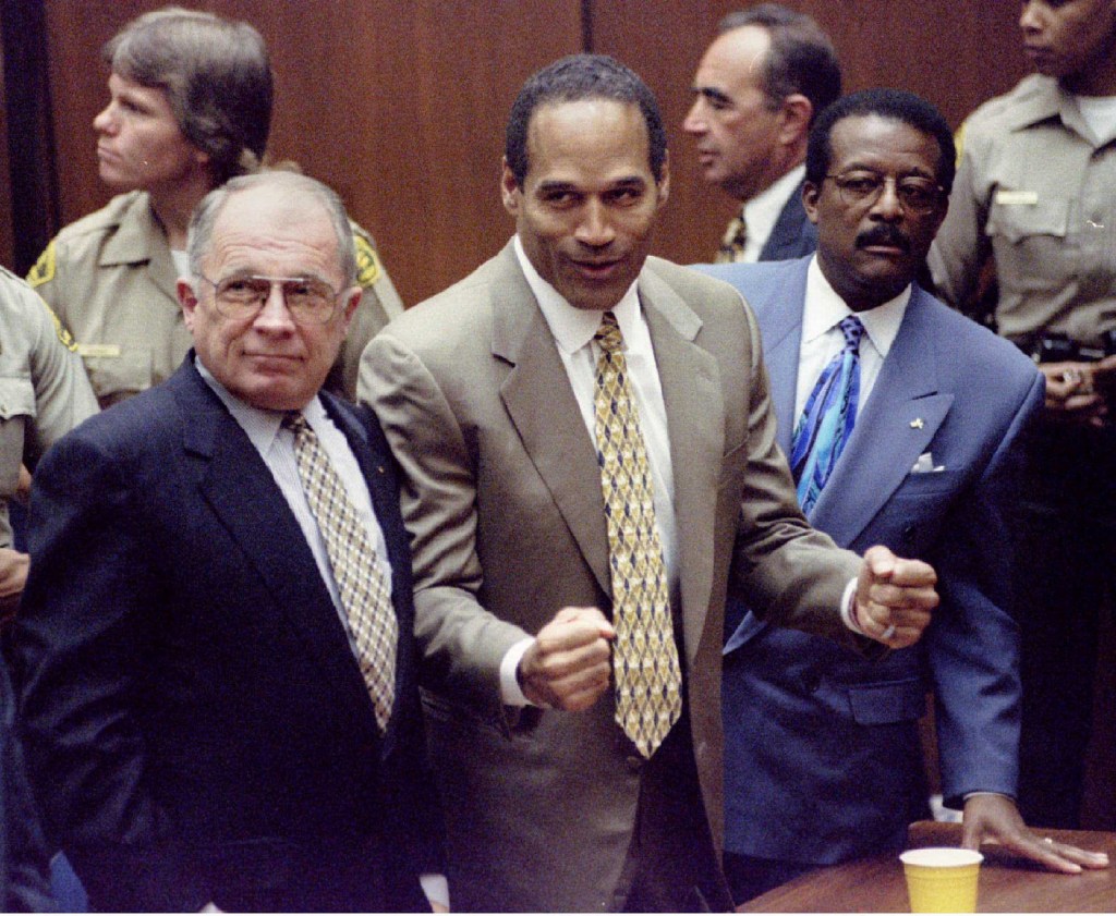 In 1995, Simpson (flanked by lawyers F. Lee Bailey, left, and Johnnie Cochran, right) was acquitted of murdering his ex-wife and her friend.