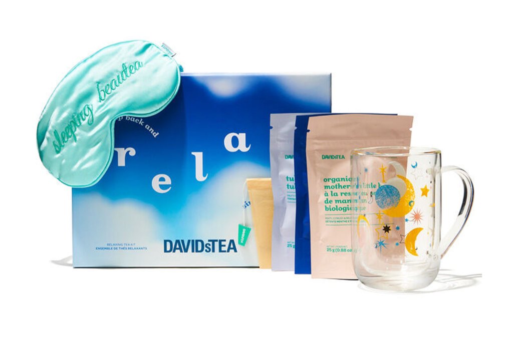 A box with a glass and a sleeping mask part of a relaxation kit