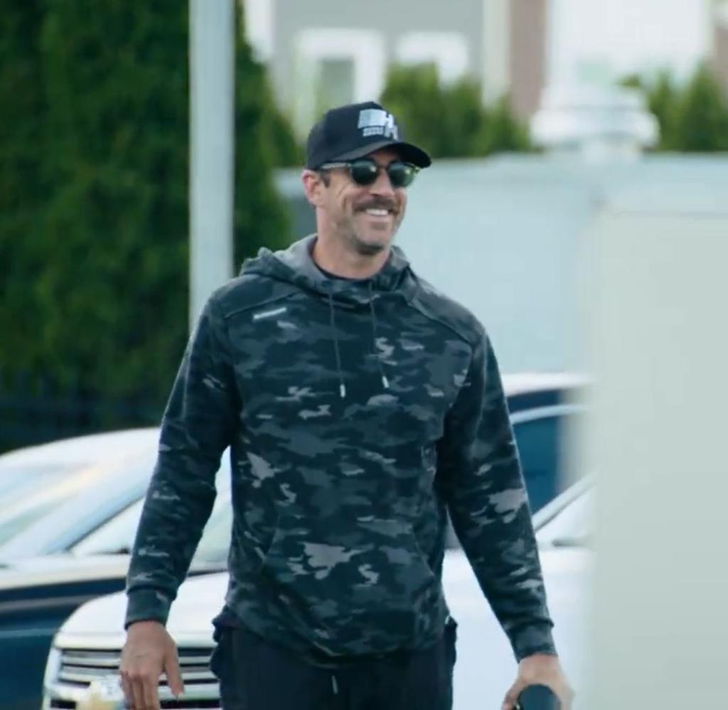 Aaron Rodgers was all smiles as he arrived at the Jets' practice facility.